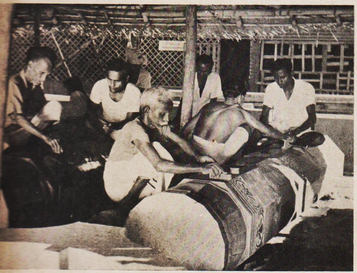 Cylindrical surfaces of dressed pillars being polished by hand.