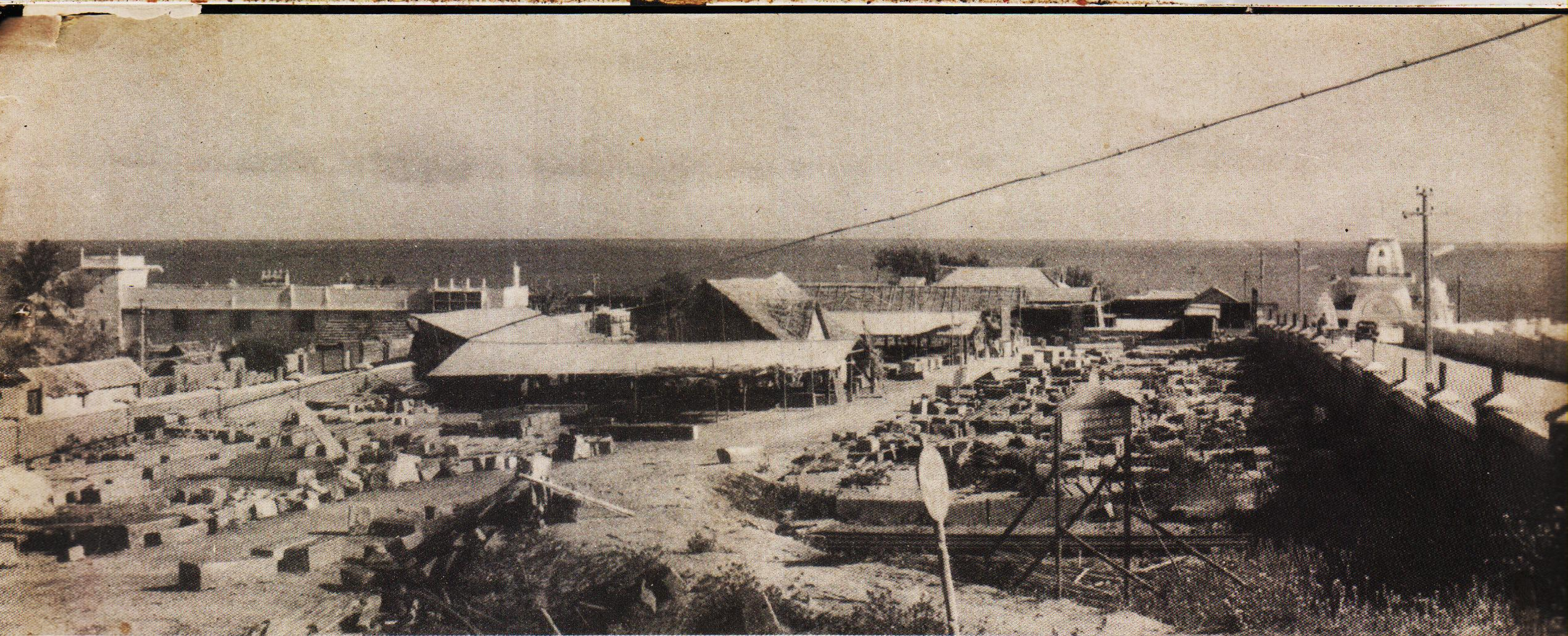 The Committee's spacious stone-dressing yard with several work-sheds on the Kanyakumari shore.