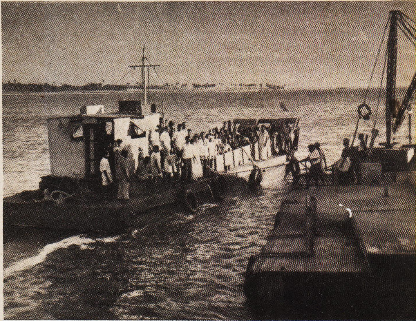 The Committee's boat 'Vijaya' with workmen on board.